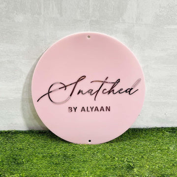 🌟 Round Acrylic Logo Sign – Pink Base with Rose Gold Lettering