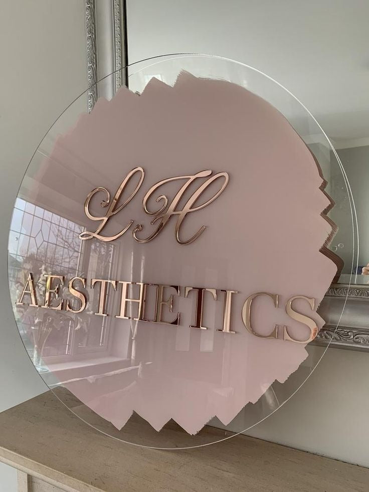 🌟 Round Acrylic Logo Sign – Rose Gold Letters with Pink Base